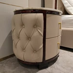 Round Cream Tufted Leather Nightstand with White Marble Top and Dark Glossy Frame